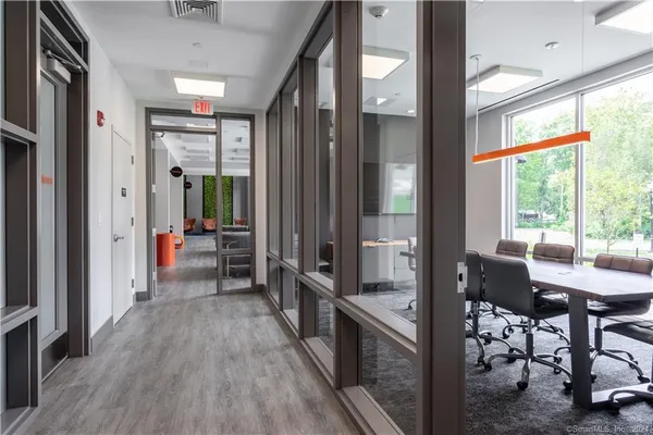 a view of a swimming pool with a lounge chairs