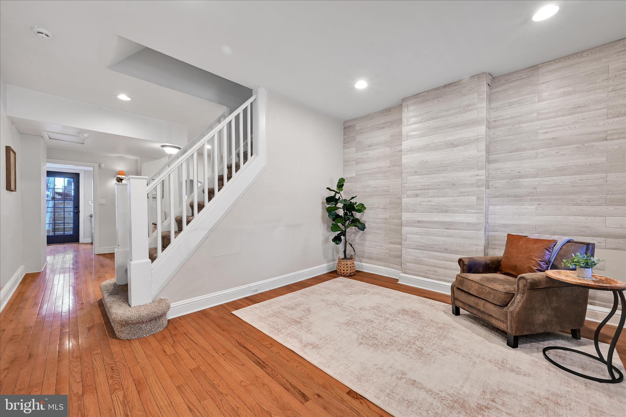 205 Front Street Conshohocken, PA 19428 - Photo 11 of 31 a living room with furniture and wooden floor