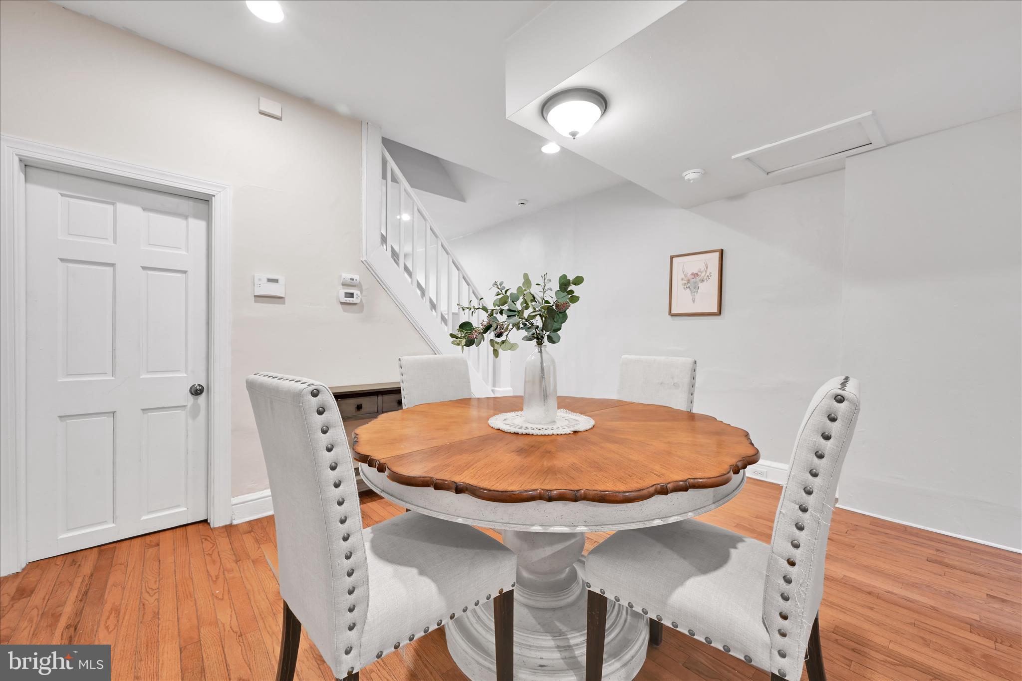205 Front Street Conshohocken, PA 19428 - Photo 13 of 31 a dining room with furniture and wooden floor