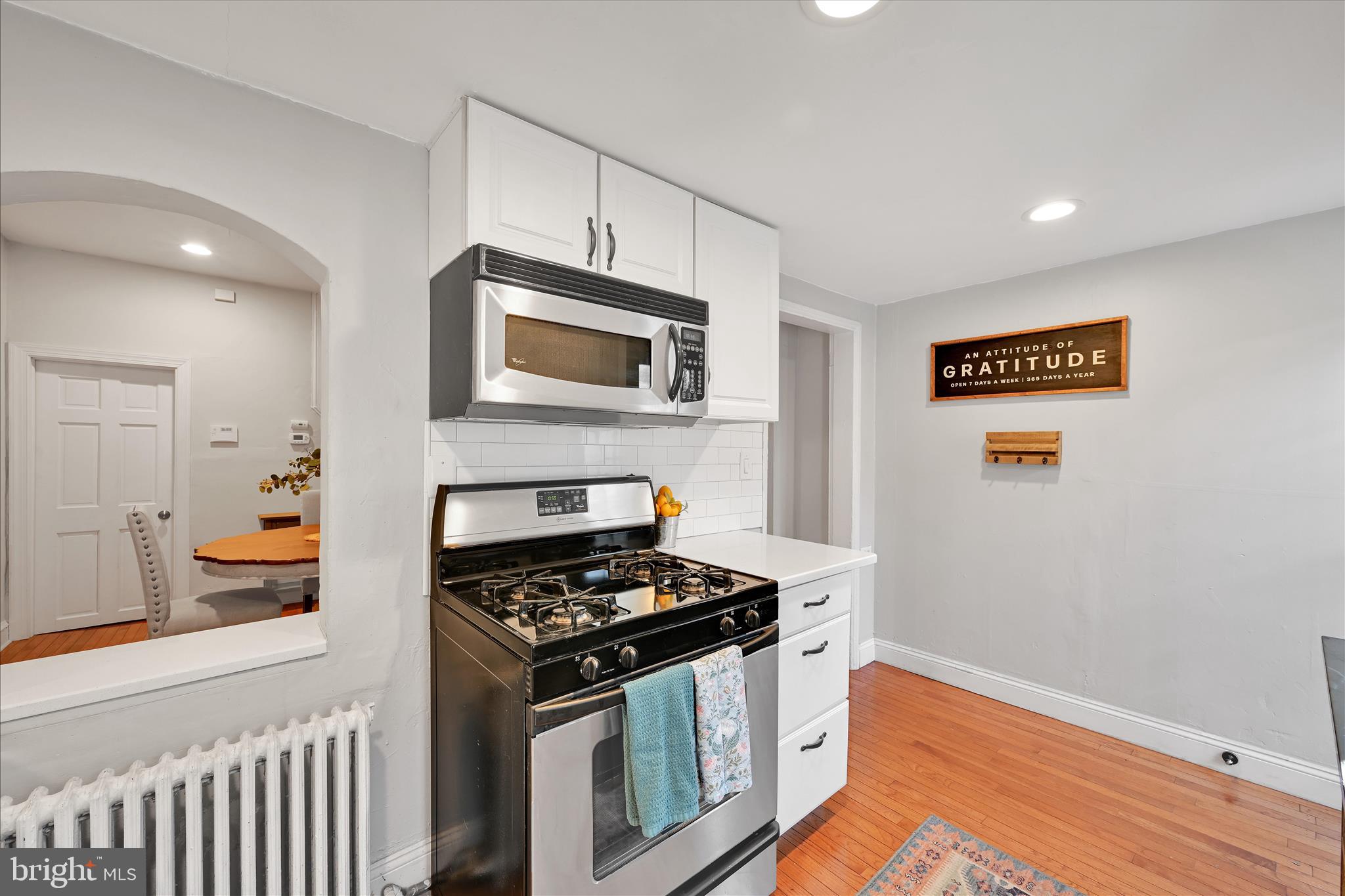 205 Front Street Conshohocken, PA 19428 - Photo 16 of 31 a kitchen with stainless steel appliances a stove a microwave and a refrigerator
