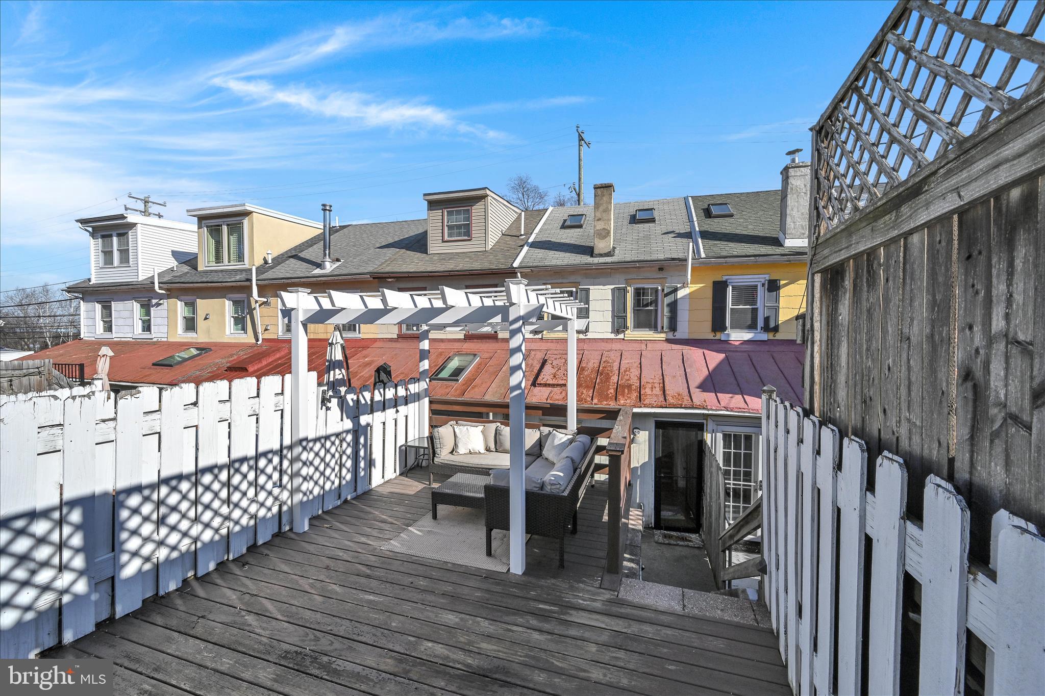 205 Front Street Conshohocken, PA 19428 - Photo 31 of 31 a view of a chairs and table on the wooden deck