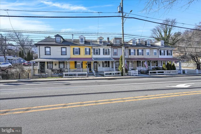 a view of brick building with a large windows