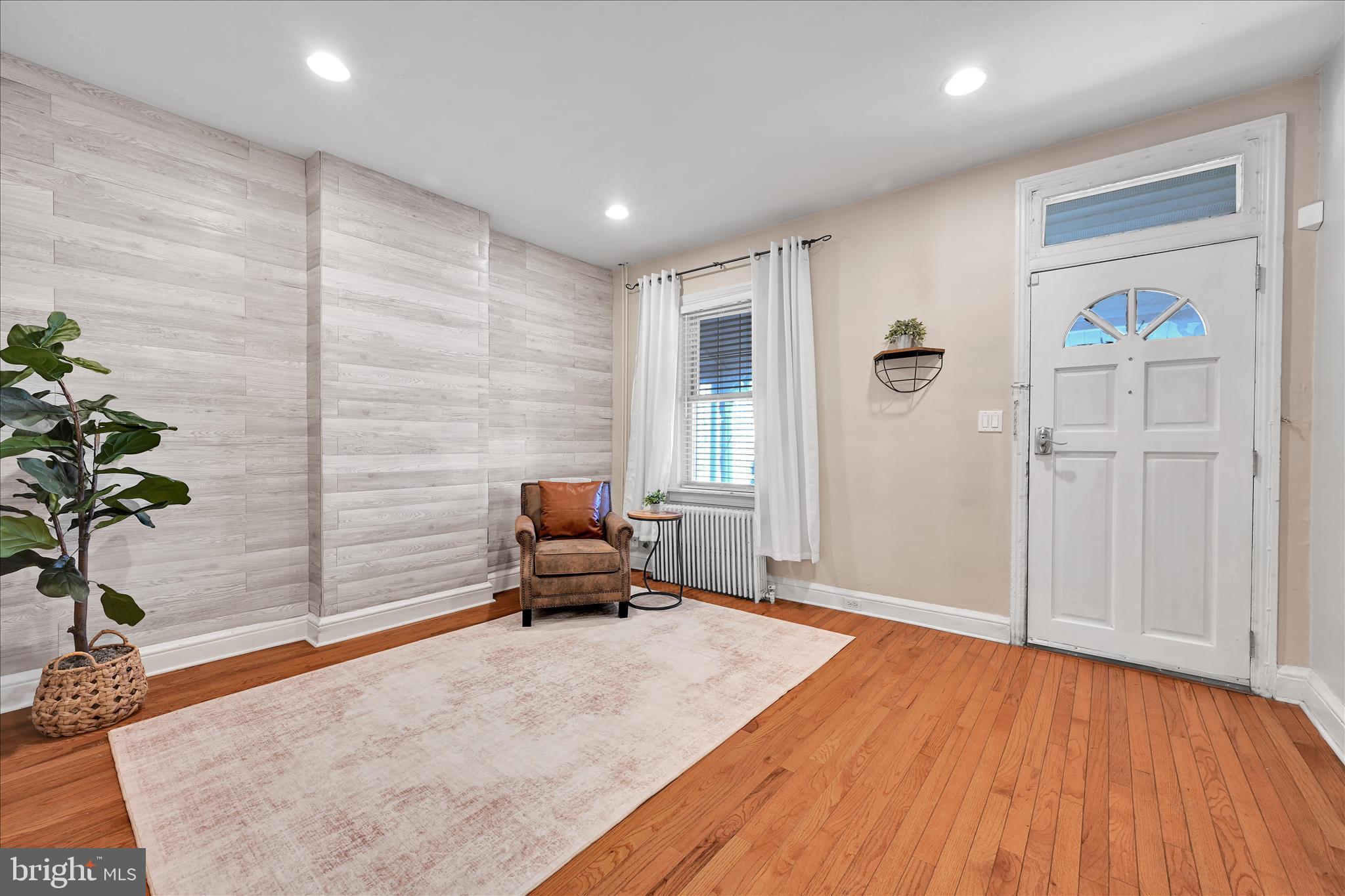 205 Front Street Conshohocken, PA 19428 - Photo 8 of 31 a furnished livingroom with windows and wooden floor