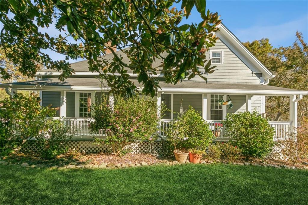 2340 Birmingham Road Milton, GA 30004 - Photo 1 of 1 front view of a house with a yard