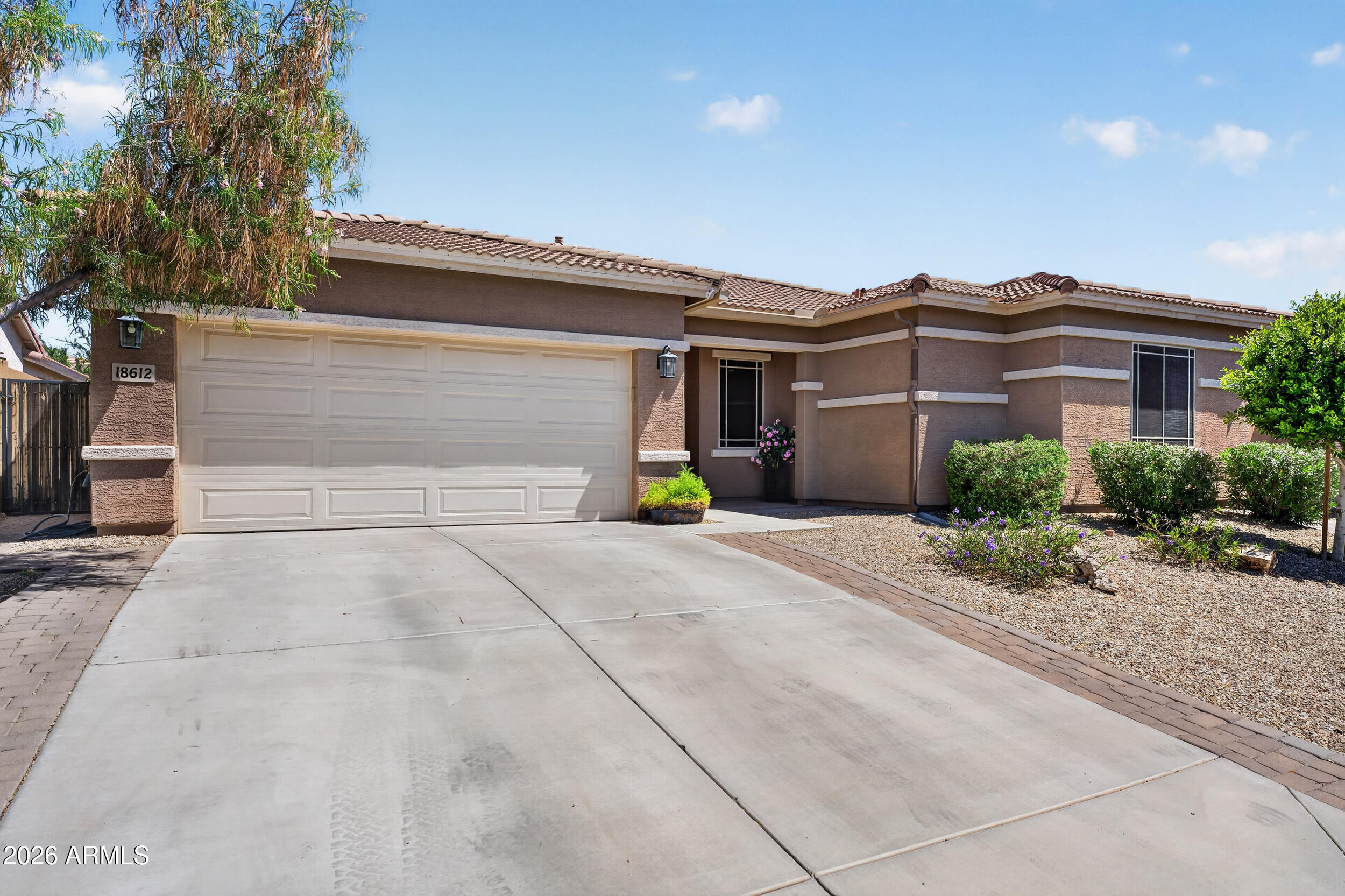 18612 West Mountain View Road Waddell, AZ 85355 - Photo 2 of 71 a view of a house with a street