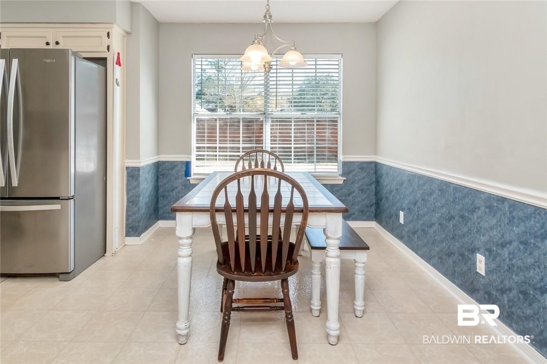 6601 Conde Court Mobile, AL 36695 - Photo 14 of 30 Dining area with a chandelier