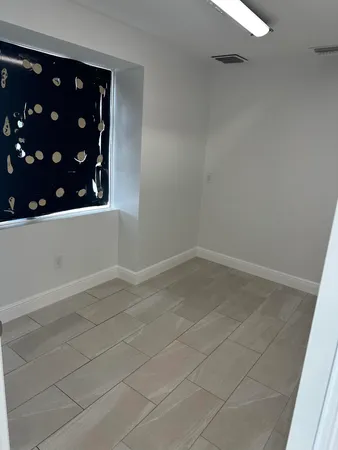 a view of a room with an empty space