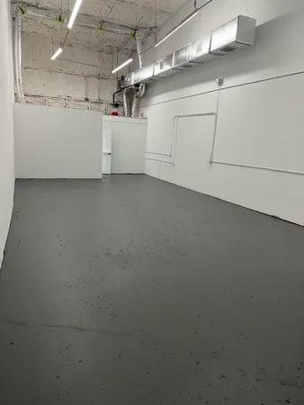 a bathroom with a sink a mirror and a toilet