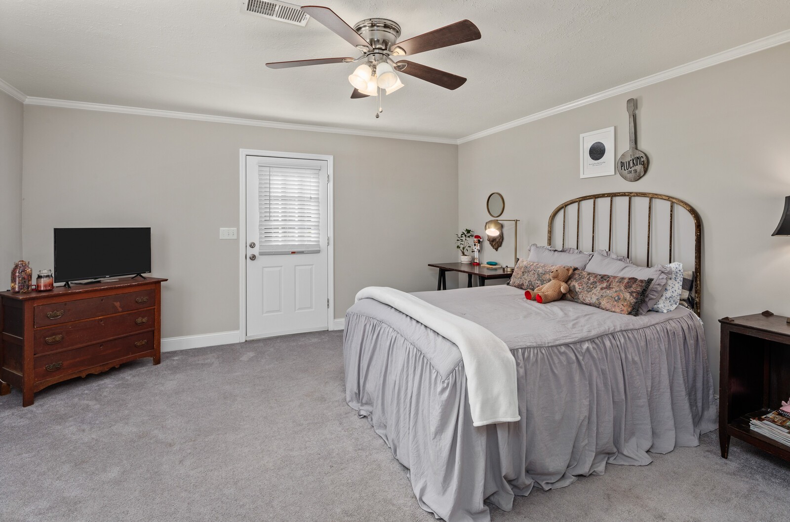 2531 Pleasant View Road Pleasant View, TN 37146 - Photo 19 of 35 a bedroom with a bed and a tv in it