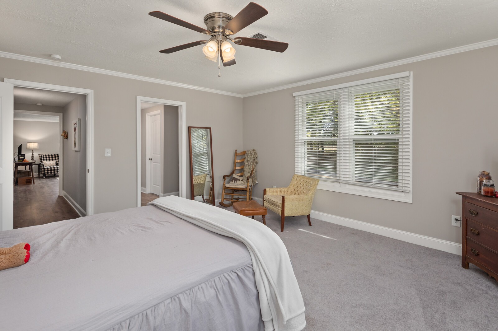 2531 Pleasant View Road Pleasant View, TN 37146 - Photo 20 of 35 a bedroom with a bed and a chandelier