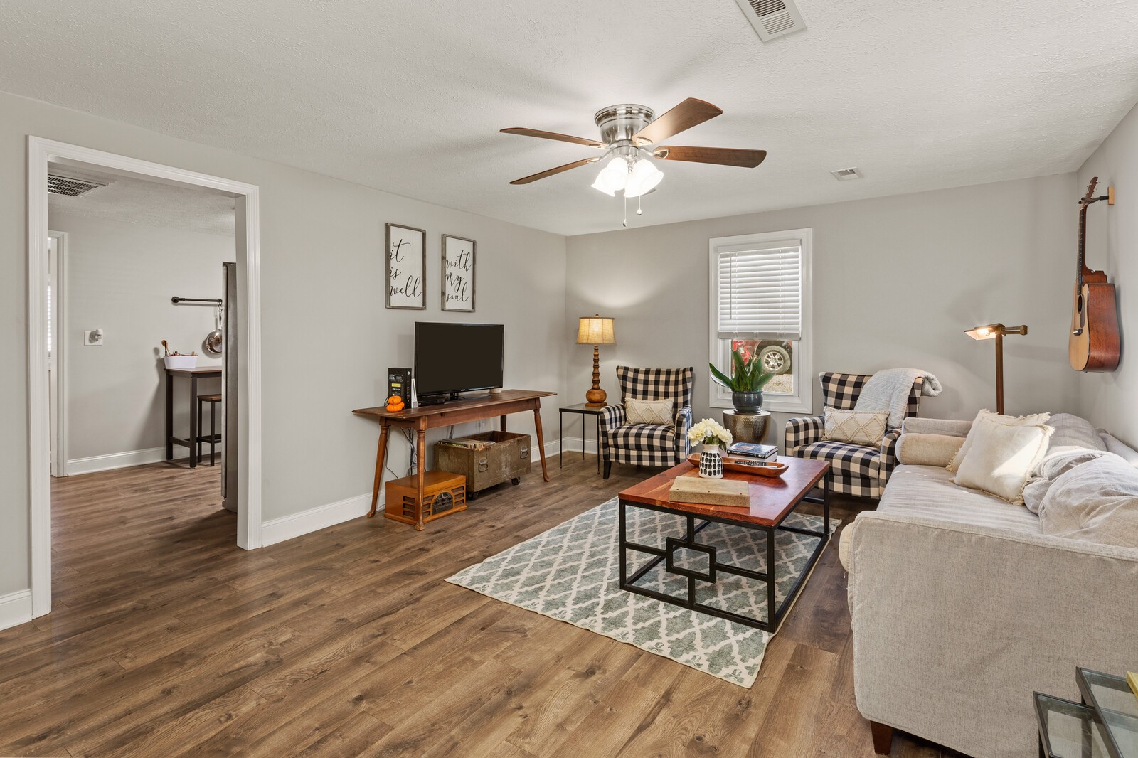2531 Pleasant View Road Pleasant View, TN 37146 - Photo 6 of 35 a living room with furniture and a flat screen tv