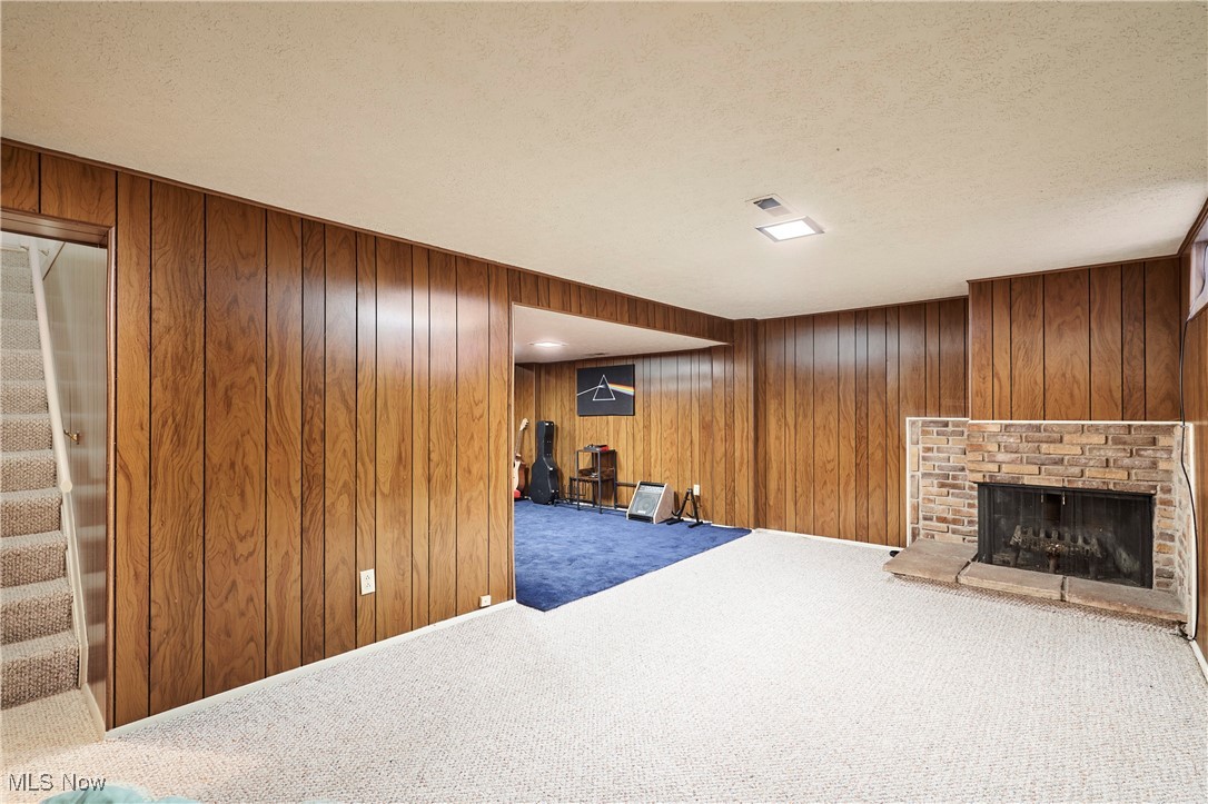 916 Hampton Ridge Drive Akron, OH 44313 - Photo 12 of 17 Rec Room ft. Fireplace