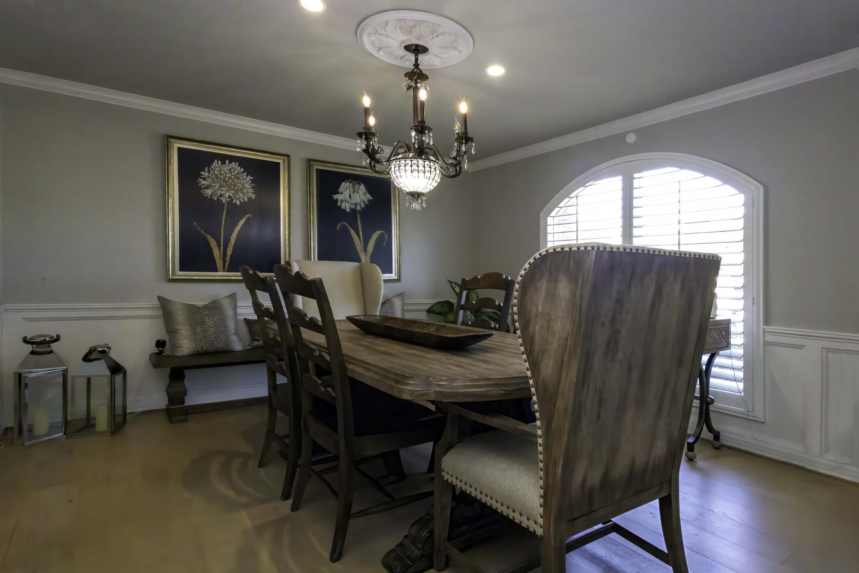 5101 2nd Street Lubbock, TX 79416 - Photo 11 of 41 a view of a dining room with furniture window and wooden floor