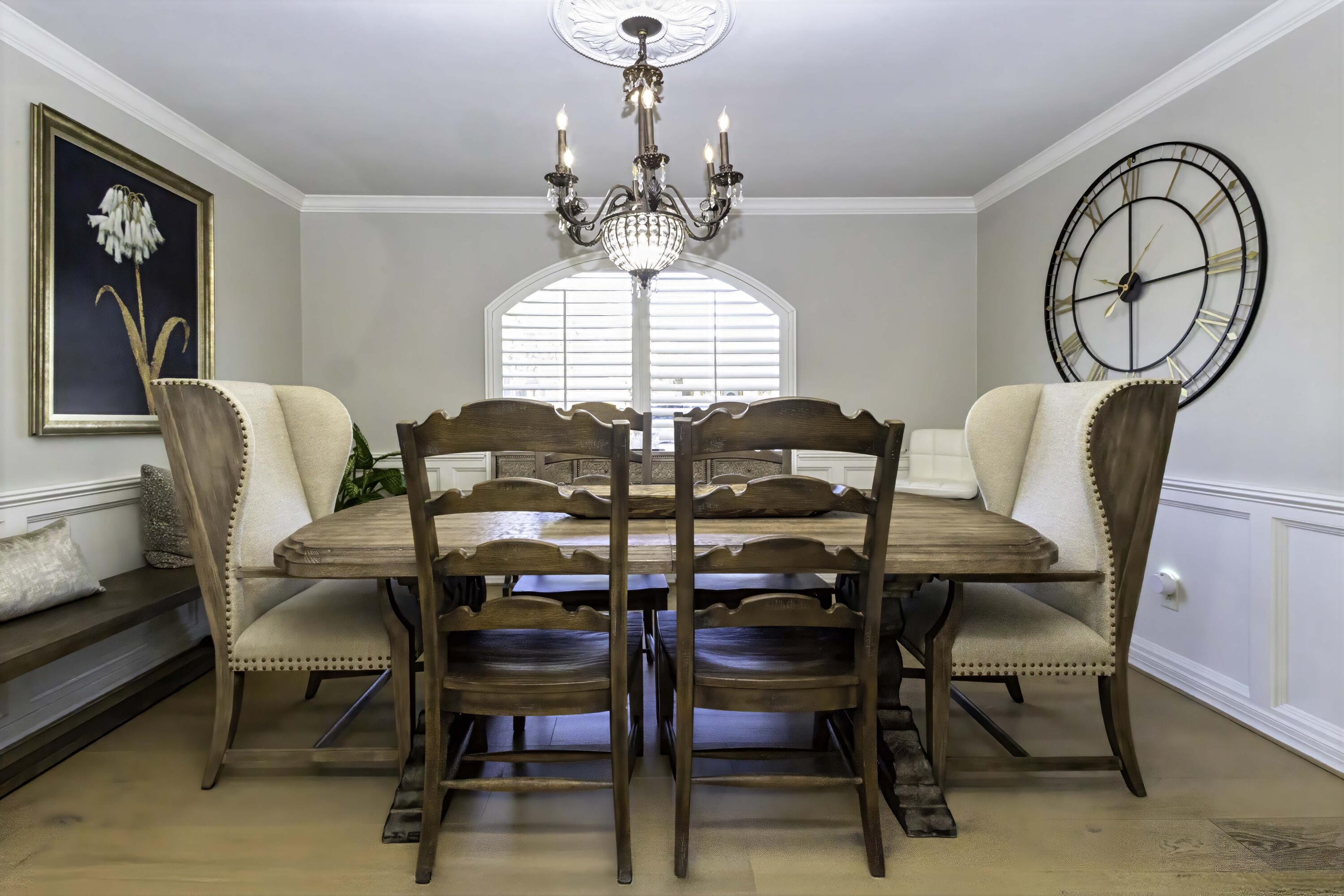 5101 2nd Street Lubbock, TX 79416 - Photo 12 of 41 a view of a dining room with furniture and chandelier