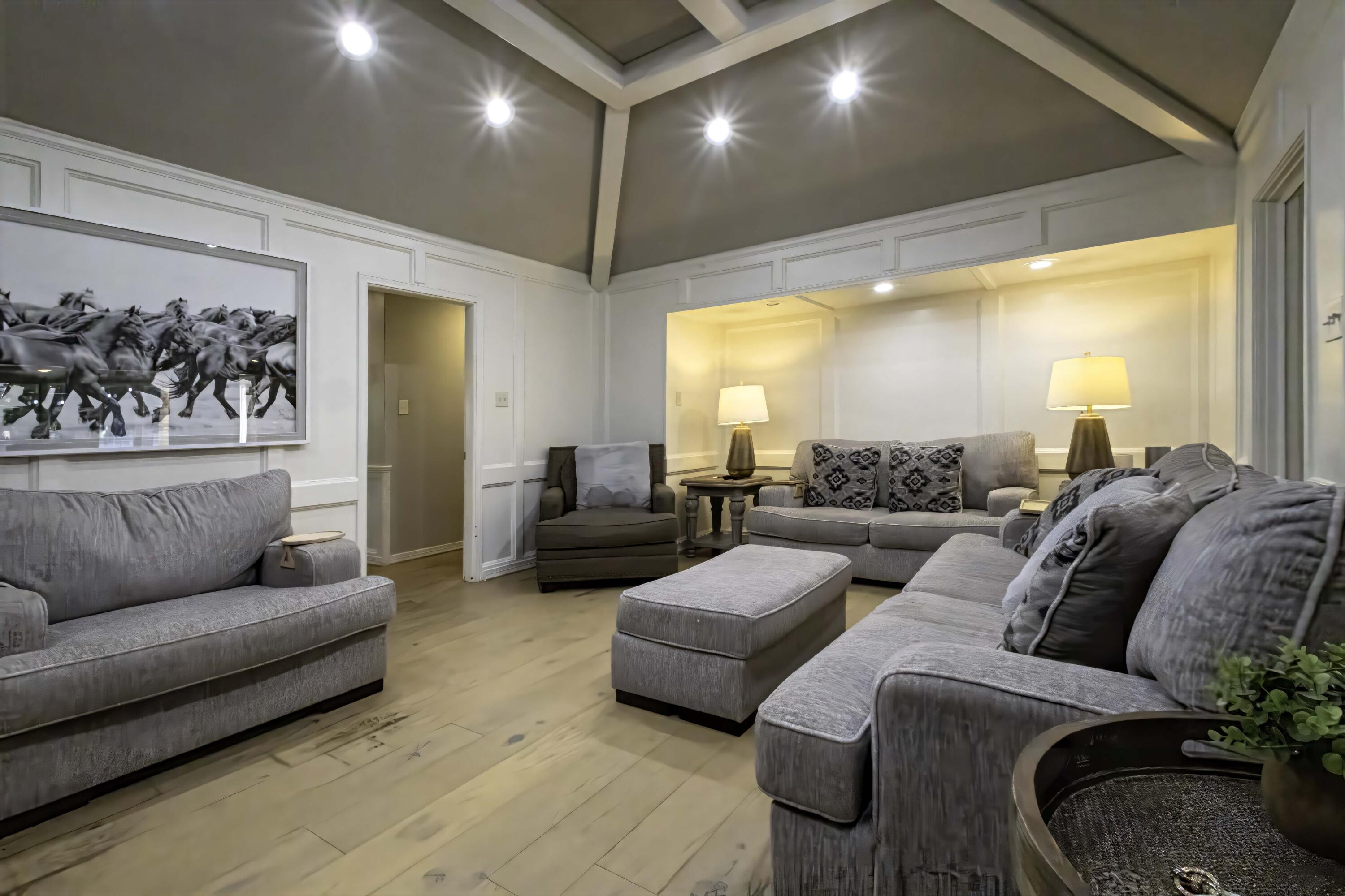 5101 2nd Street Lubbock, TX 79416 - Photo 17 of 41 a living room with furniture and a large window