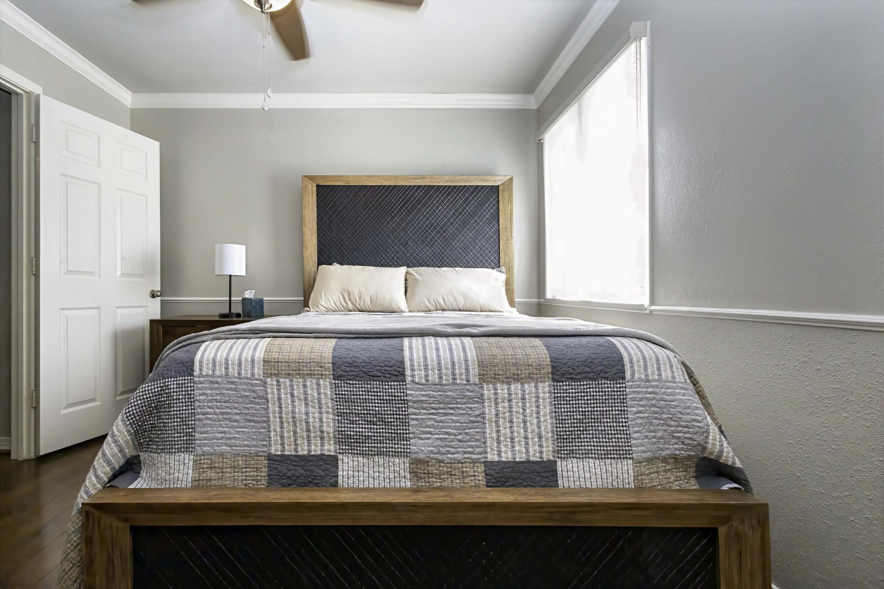 5101 2nd Street Lubbock, TX 79416 - Photo 26 of 41 a bedroom with a bed and window