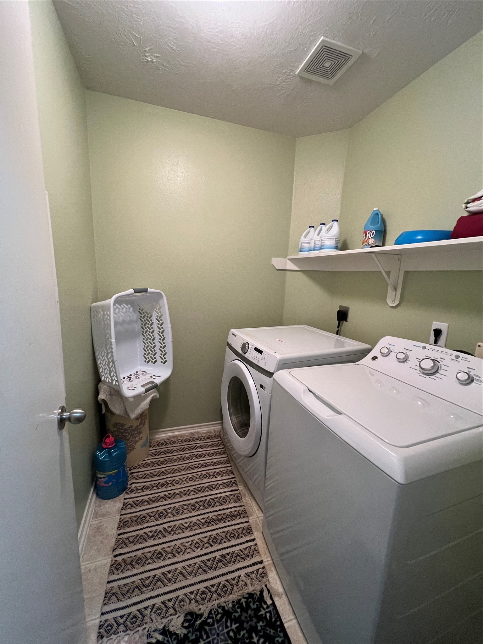 20002 Karlanda Lane Houston, TX 77073 - Photo 16 of 24 a utility room with dryer and washer