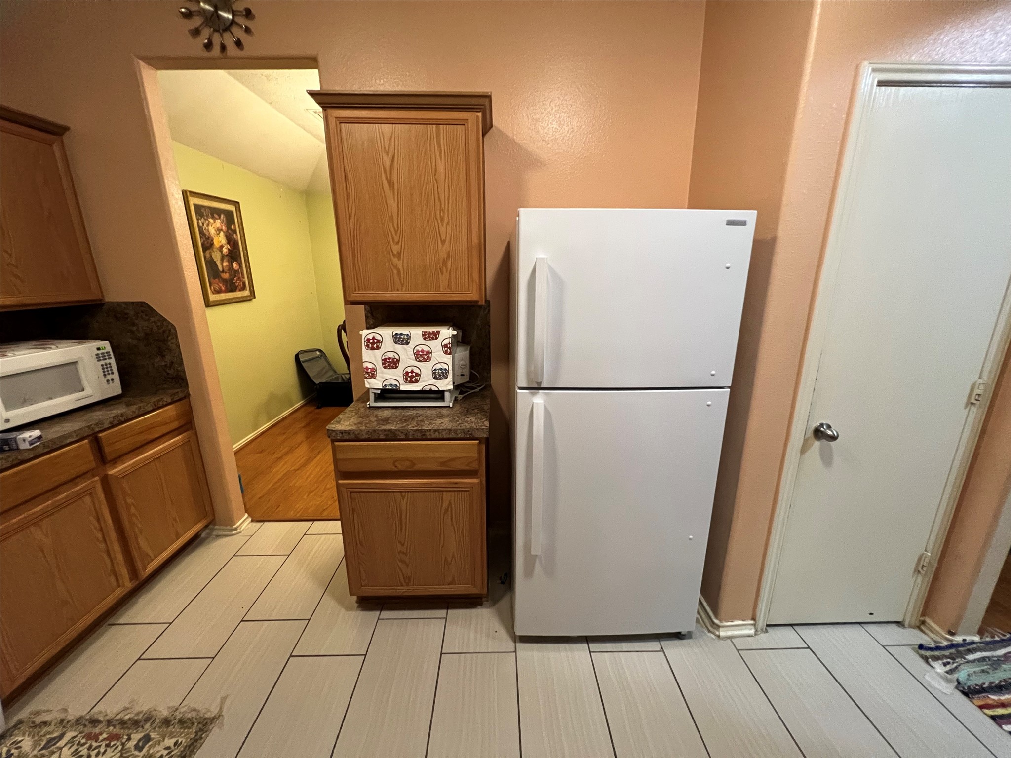 20002 Karlanda Lane Houston, TX 77073 - Photo 18 of 24 a kitchen with a refrigerator and a stove
