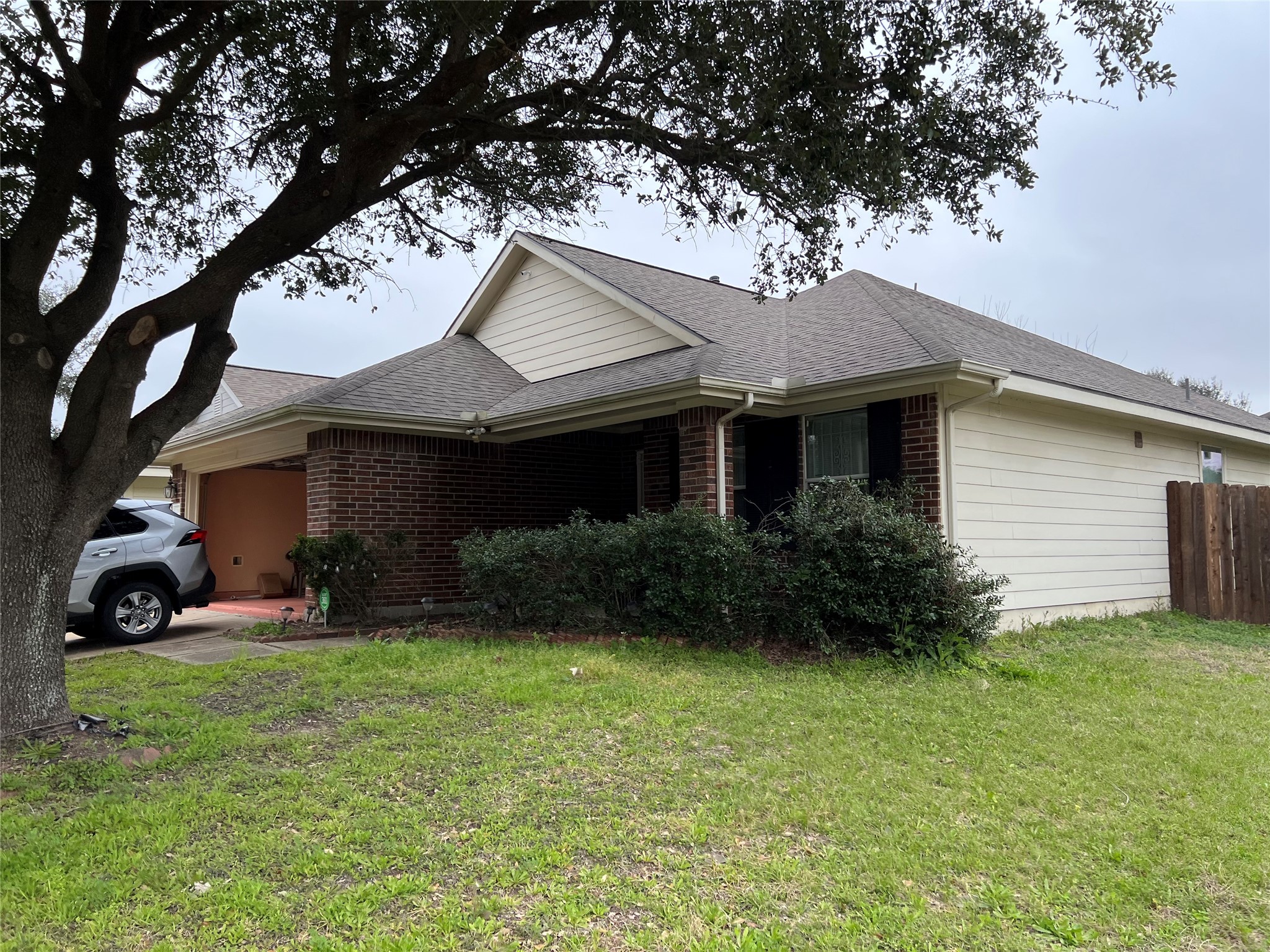 20002 Karlanda Lane Houston, TX 77073 - Photo 2 of 24 a front view of a house with garden