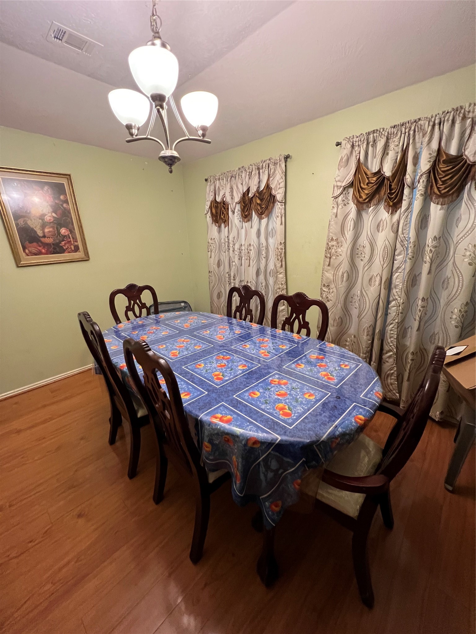 20002 Karlanda Lane Houston, TX 77073 - Photo 21 of 24 a view of a dining room with furniture and wooden floor