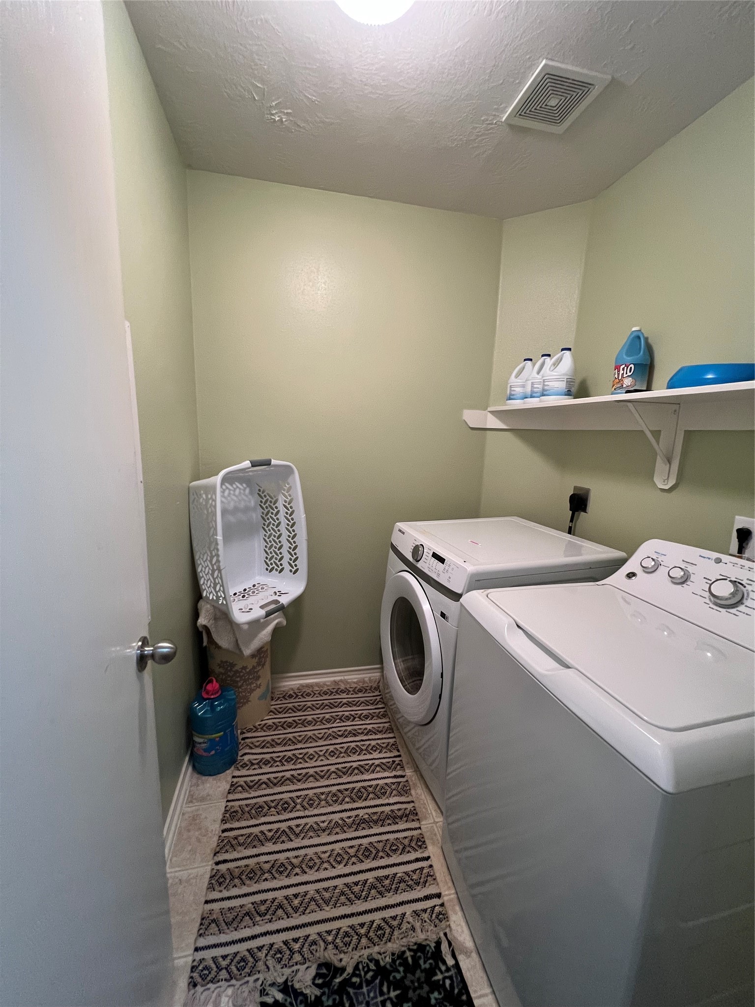 20002 Karlanda Lane Houston, TX 77073 - Photo 22 of 24 a utility room with dryer and washer