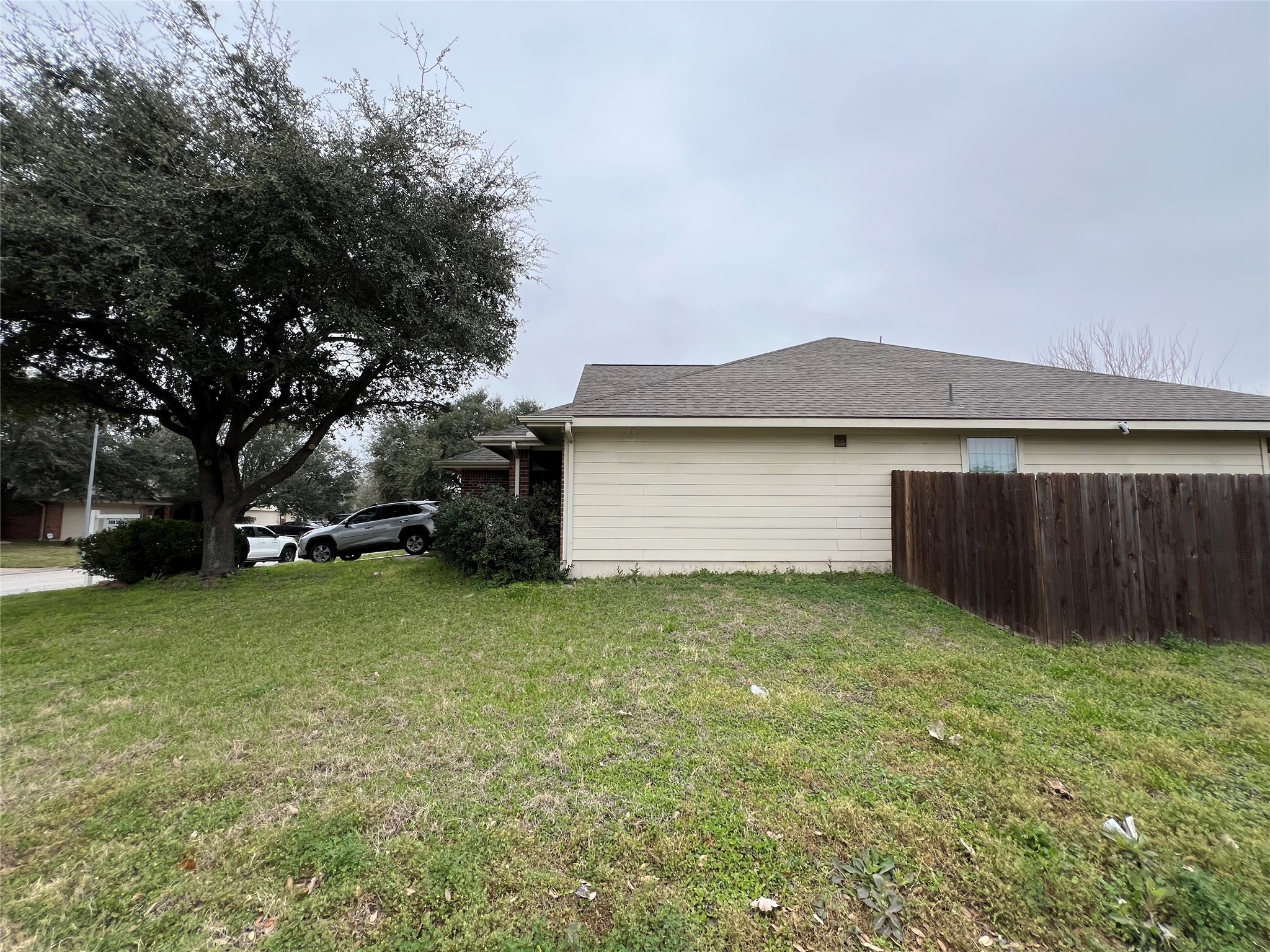 20002 Karlanda Lane Houston, TX 77073 - Photo 7 of 24 a view of backyard of house with green space