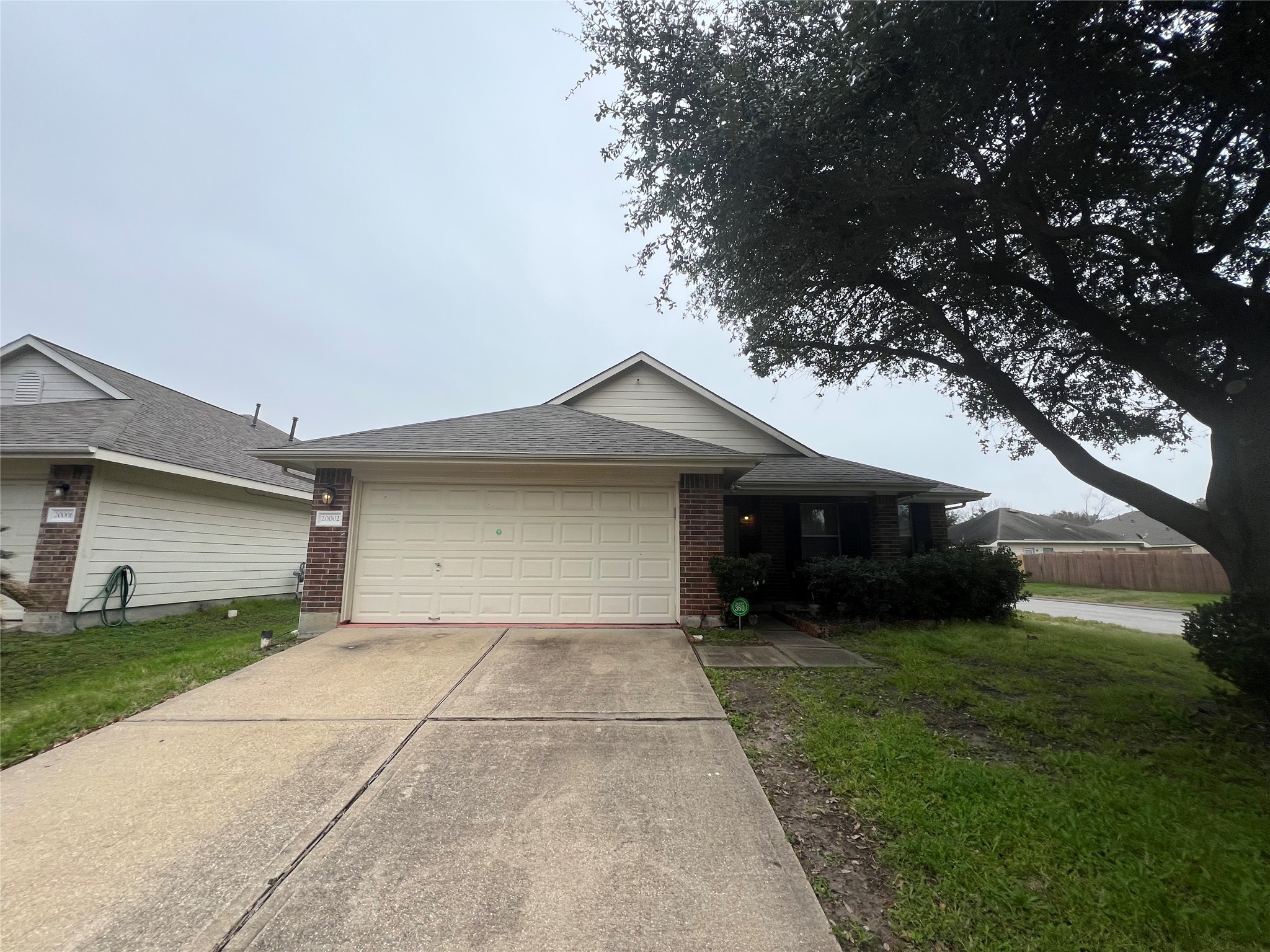 20002 Karlanda Lane Houston, TX 77073 - Photo 9 of 24 a view of a house with a yard