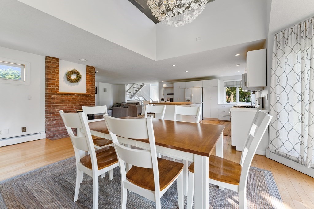 54 Kennedy Street Chicopee, MA 01013 - Photo 11 of 42 a view of a dining room with furniture and wooden floor