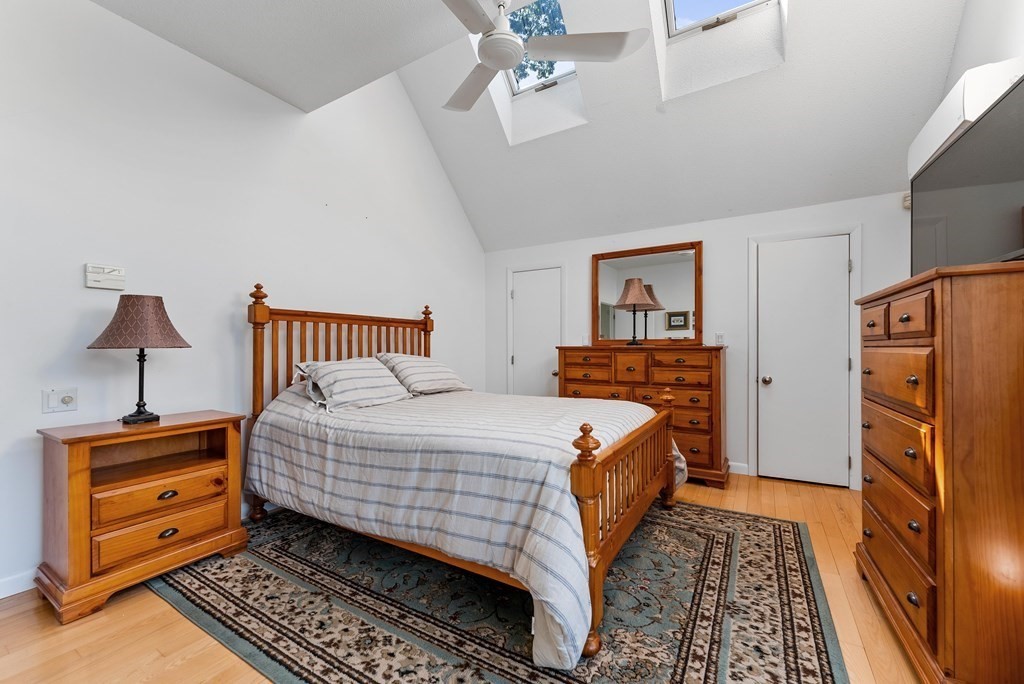 54 Kennedy Street Chicopee, MA 01013 - Photo 21 of 42 a bedroom with bed and cabinet