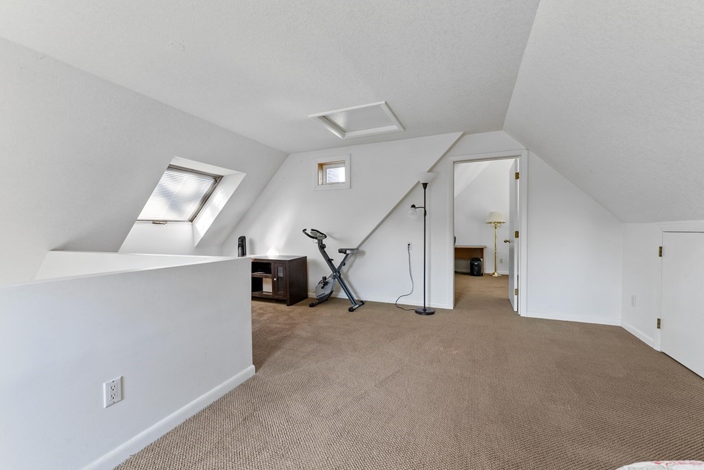 54 Kennedy Street Chicopee, MA 01013 - Photo 26 of 42 a view of a hallway with staircase