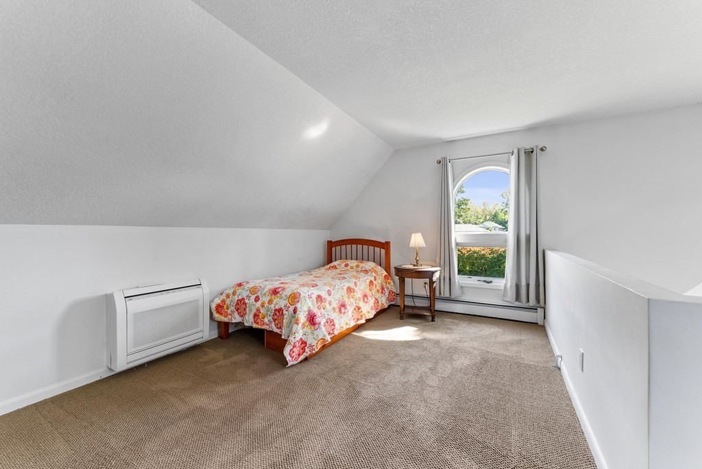 54 Kennedy Street Chicopee, MA 01013 - Photo 27 of 42 a bedroom with a bed and a window