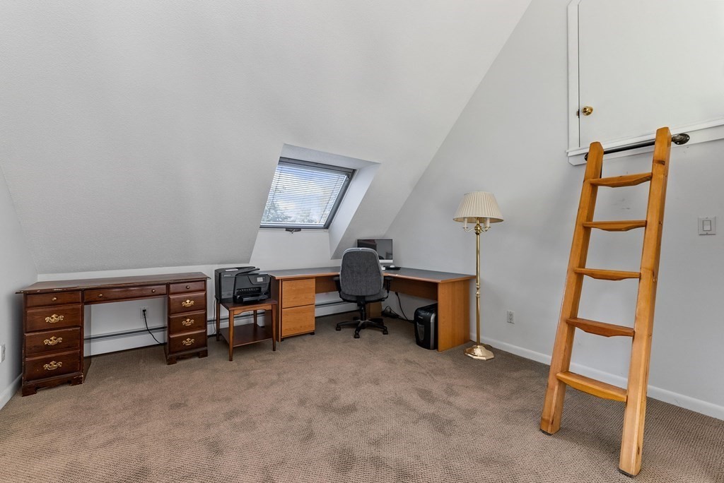 54 Kennedy Street Chicopee, MA 01013 - Photo 29 of 42 a view of a workspace with furniture