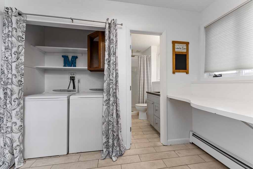 54 Kennedy Street Chicopee, MA 01013 - Photo 31 of 42 a bathroom with a sink and a mirror