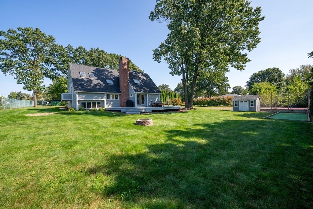 54 Kennedy Street Chicopee, MA 01013 - Photo 41 of 42 a house view with a sitting space and garden view