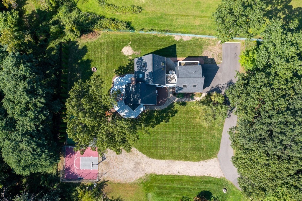 54 Kennedy Street Chicopee, MA 01013 - Photo 42 of 42 an aerial view of a house with a yard