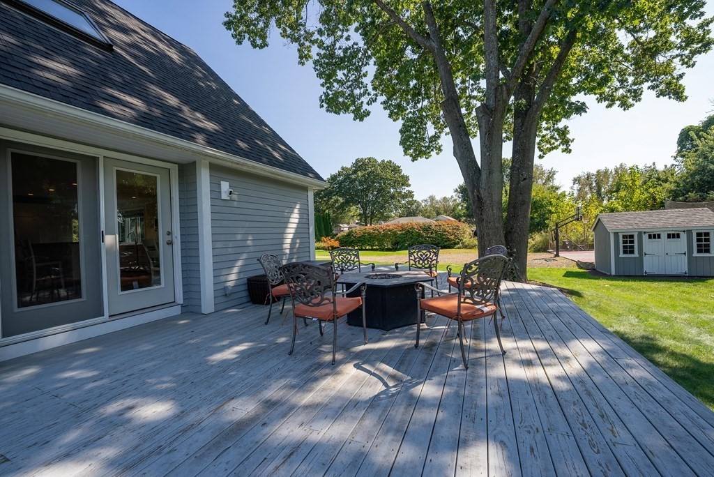 54 Kennedy Street Chicopee, MA 01013 - Photo 7 of 42 a view of a backyard with sitting area