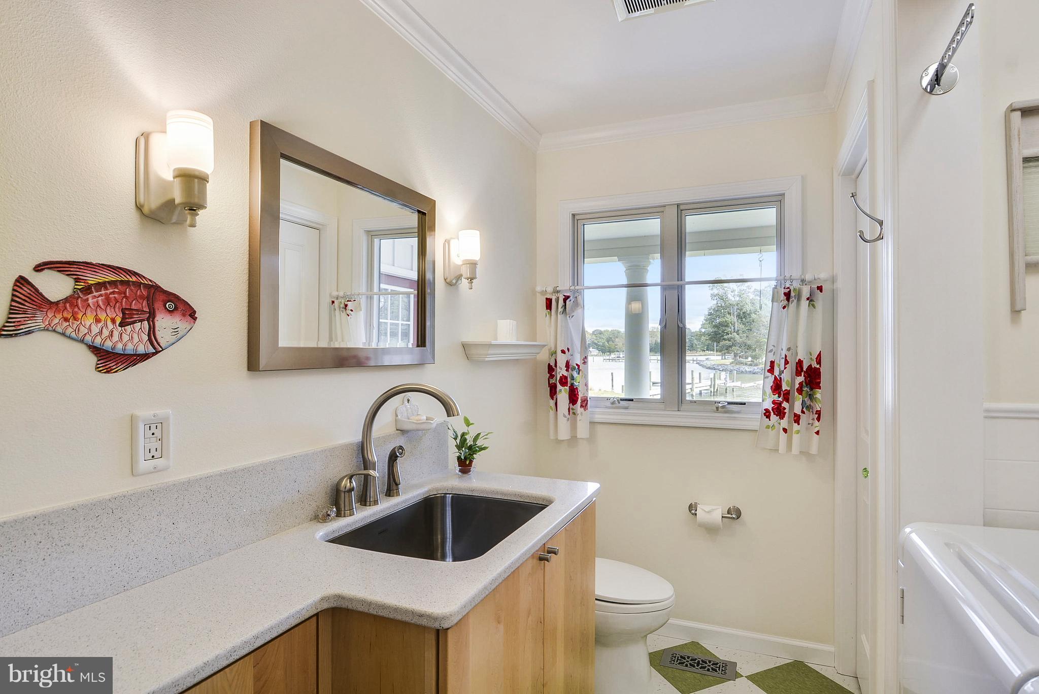 25946 River Road Newcomb, MD 21653 - Photo 14 of 30 Laundry Room with half bath
