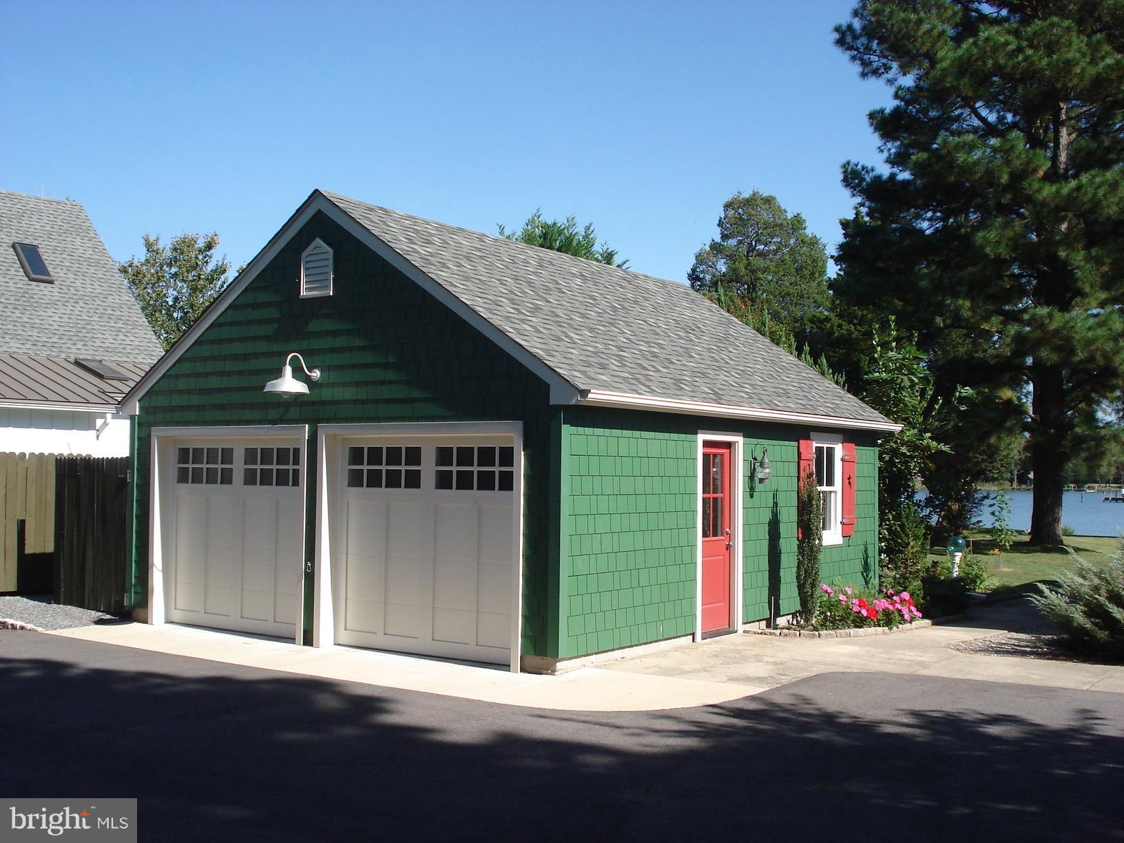 25946 River Road Newcomb, MD 21653 - Photo 25 of 30 2 car garage has rear 3rd bay for workshop/storage