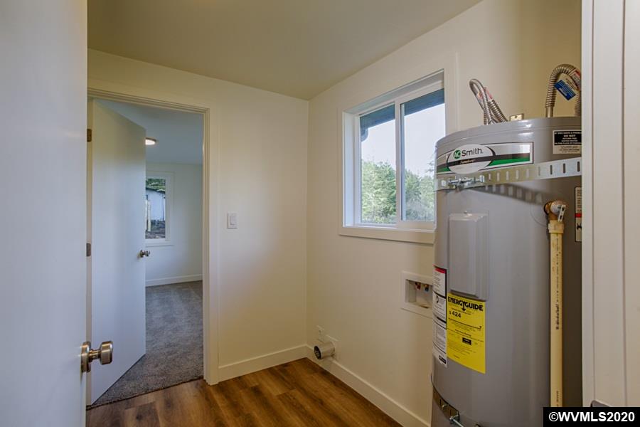 3245 Mistletoe Road Dallas, OR 97338 - Photo 25 of 28 a view of storage and utility room with a window