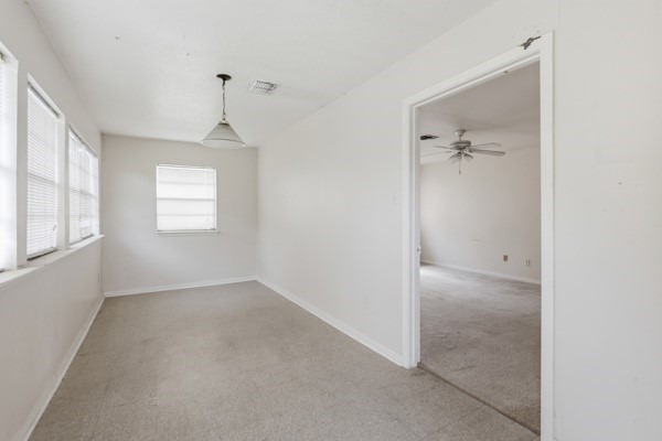 1655 Hawthorne Street Houston, TX 77006 - Photo 17 of 39 an empty room with windows and closet
