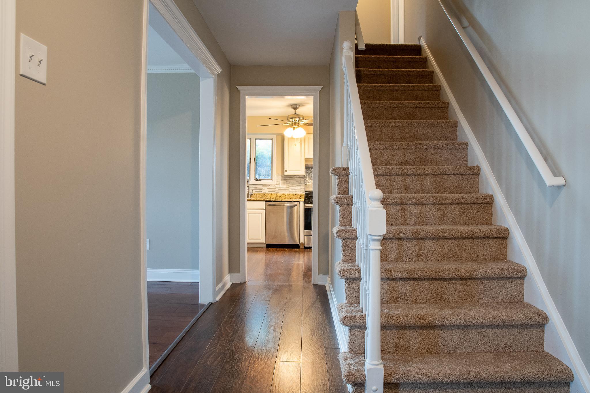 22 Duncan Road Sewell, NJ 08080 - Photo 13 of 46 a view of an entryway with wooden floor and staircase