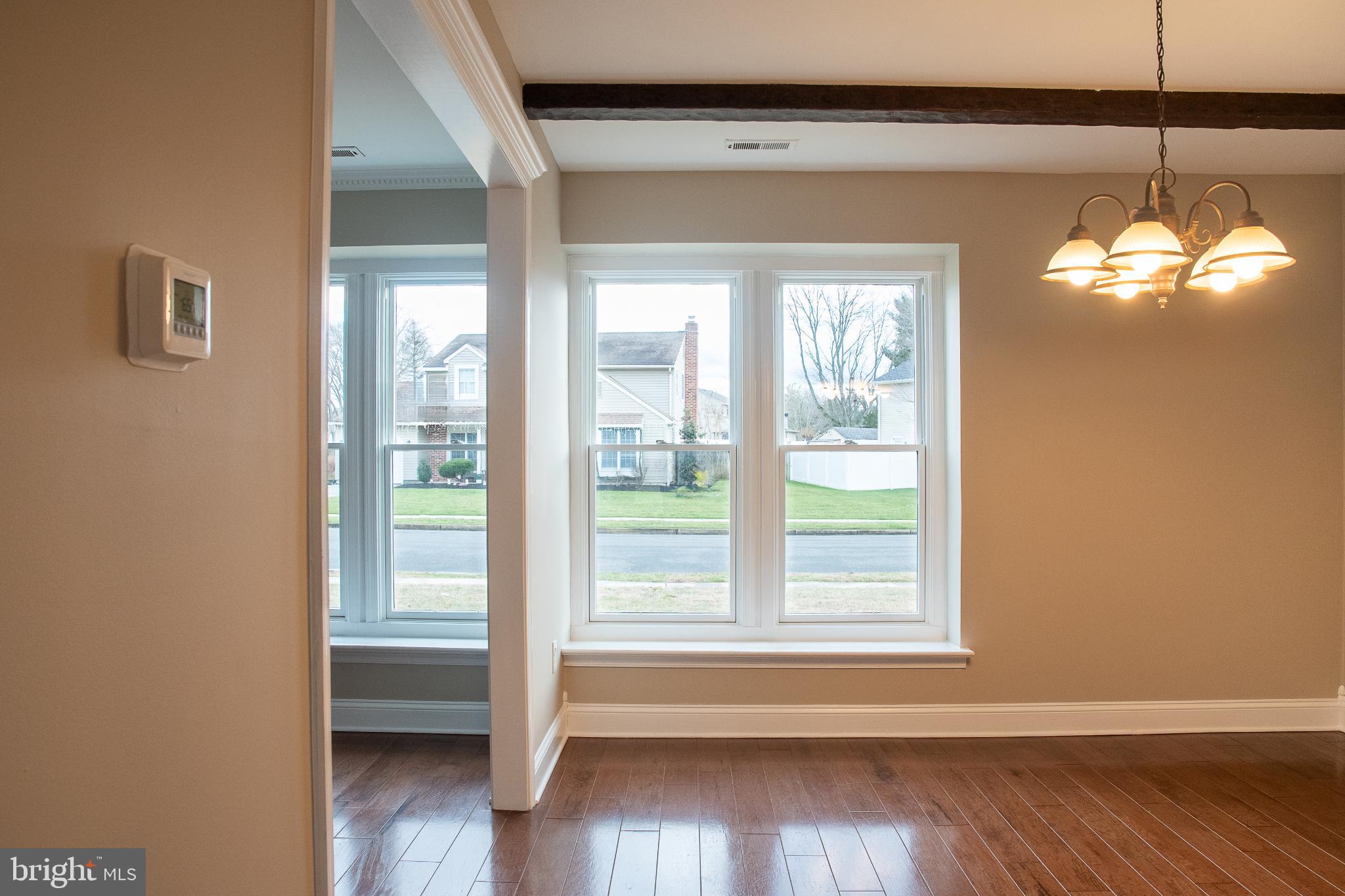 22 Duncan Road Sewell, NJ 08080 - Photo 19 of 46 a view of a room with wooden floor and a floor to ceiling window