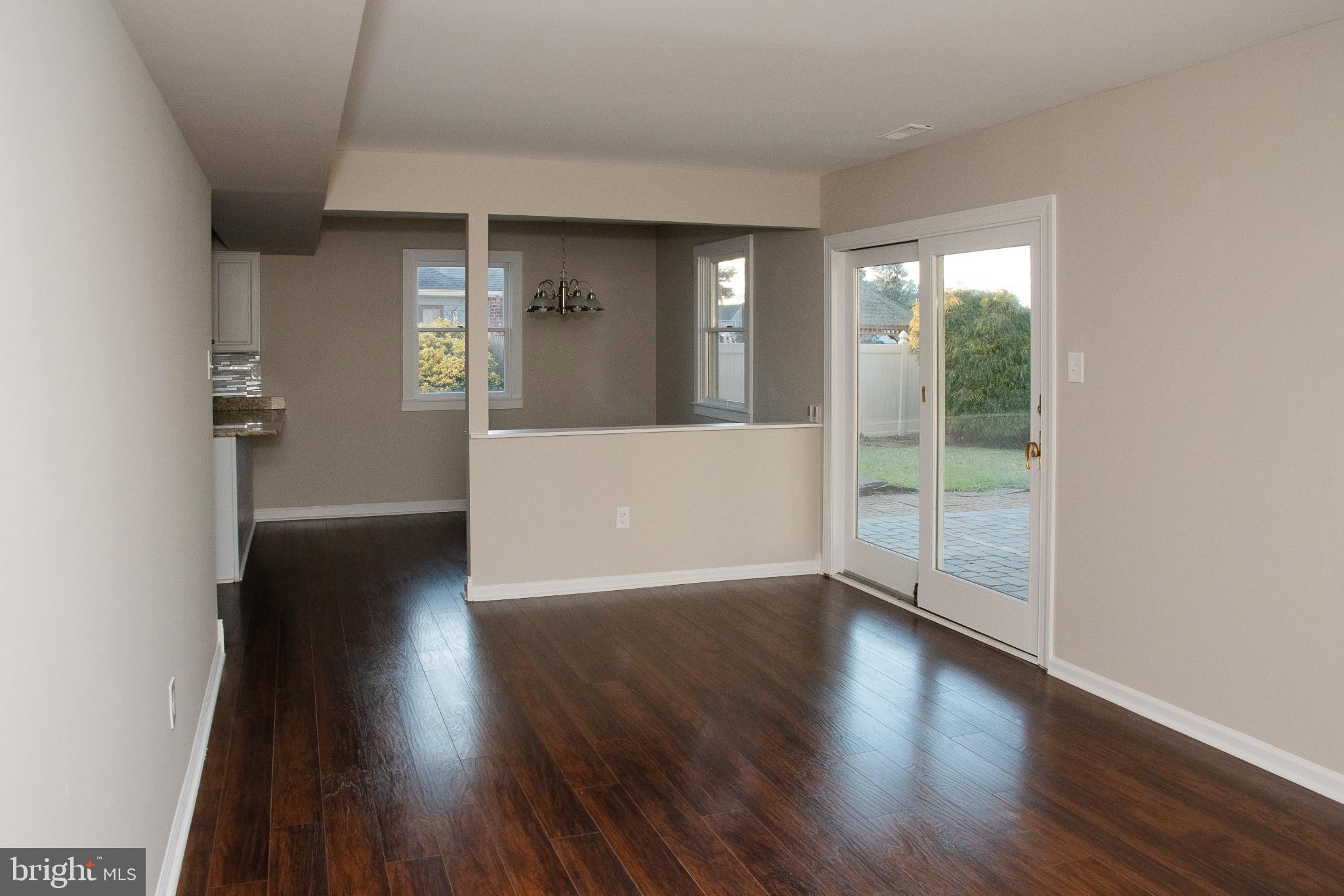 22 Duncan Road Sewell, NJ 08080 - Photo 26 of 46 wooden floor in an empty room with a window