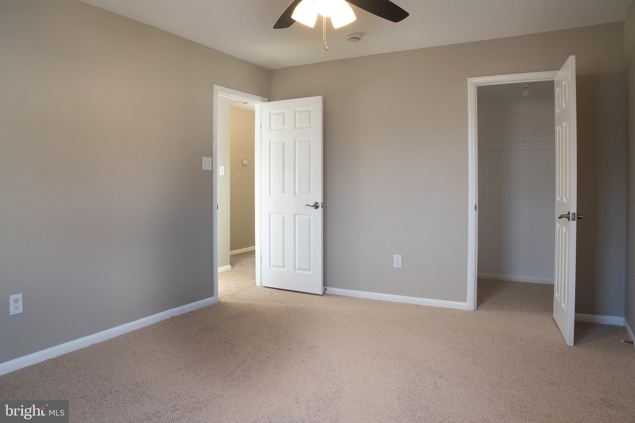22 Duncan Road Sewell, NJ 08080 - Photo 39 of 46 a view of an empty room and chandelier fan