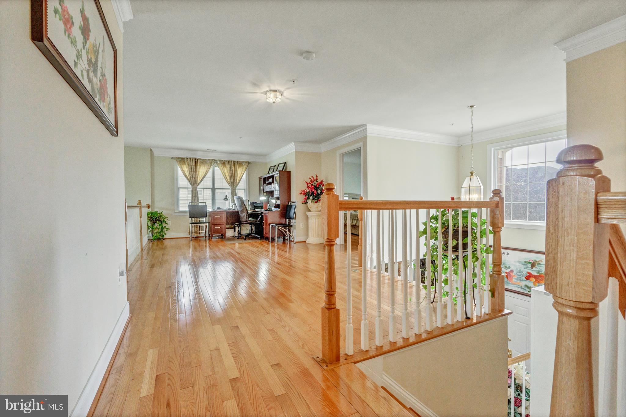 12626 Bright Spring Way Boyds, MD 20841 - Photo 3 of 30 Upper hallway with gleaming hardwood