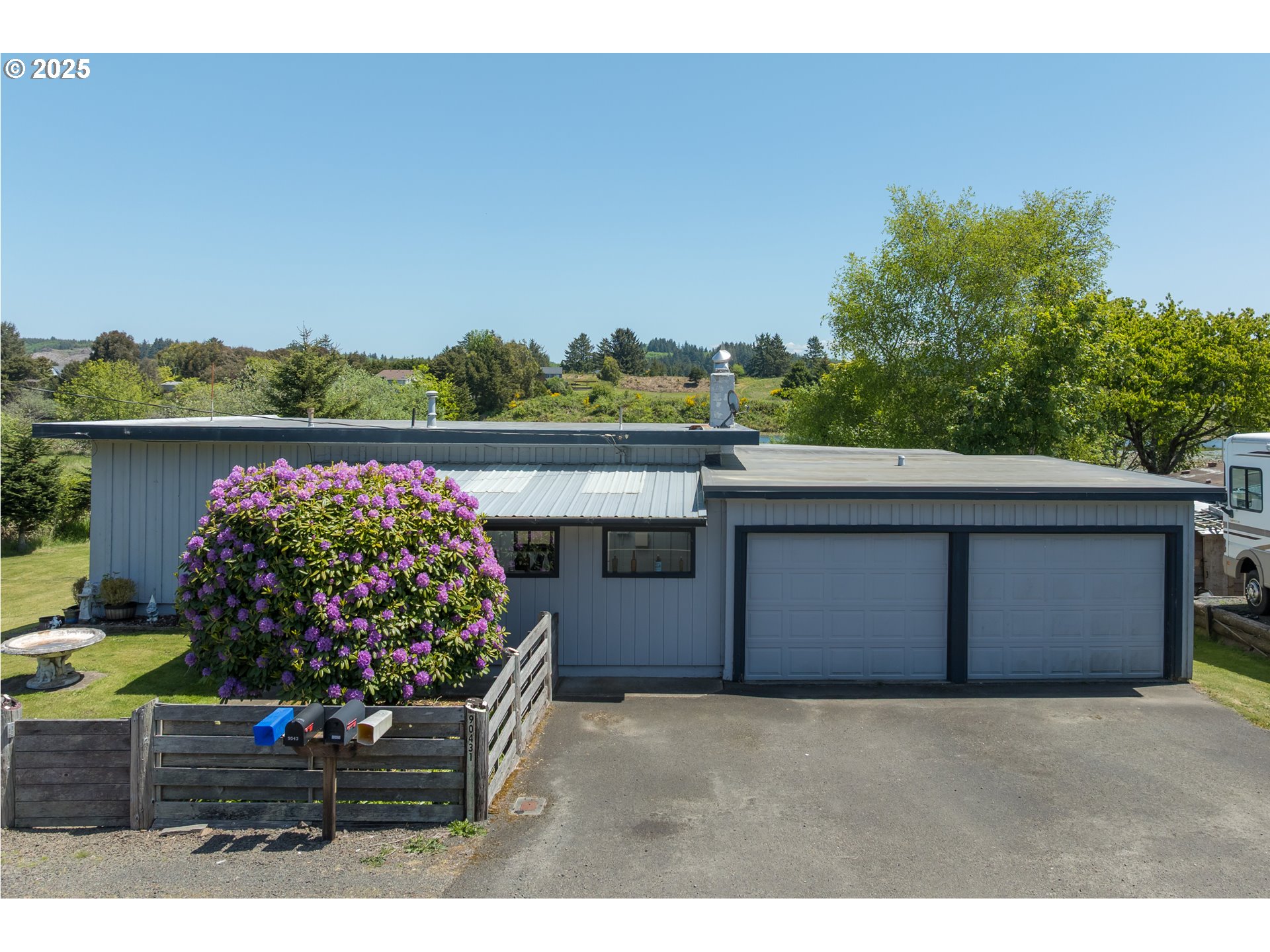 a view of an outdoor dining space with a patio