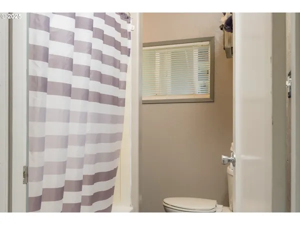 a bathroom with a sink and a shower