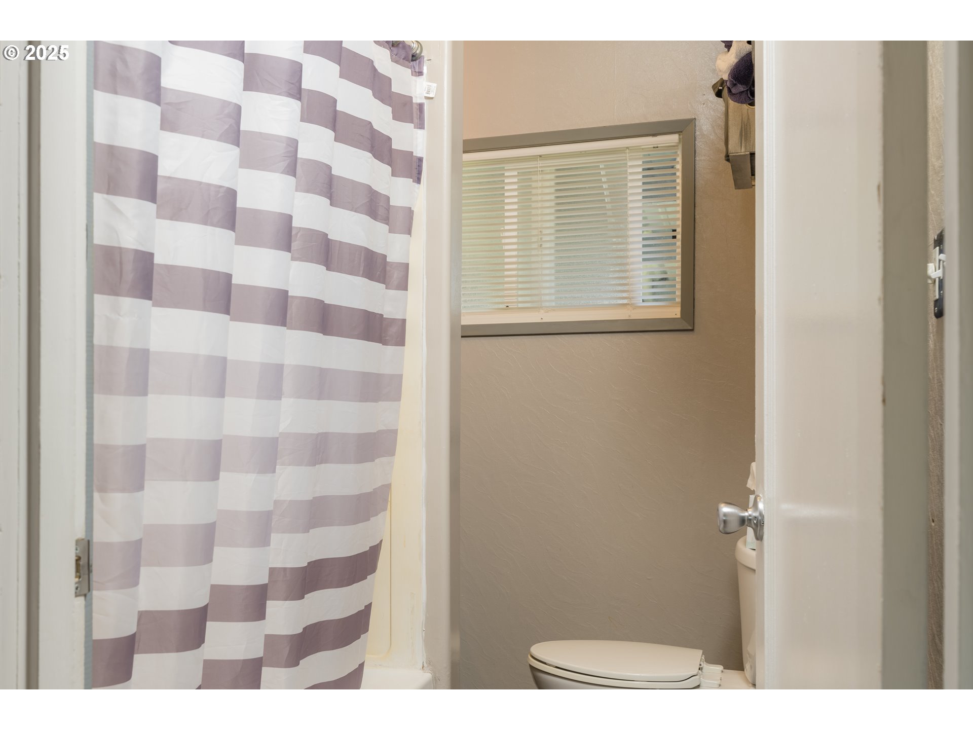 90431 Lewis Road Warrenton, OR 97146 - Photo 15 of 26 a bathroom with a sink and a shower