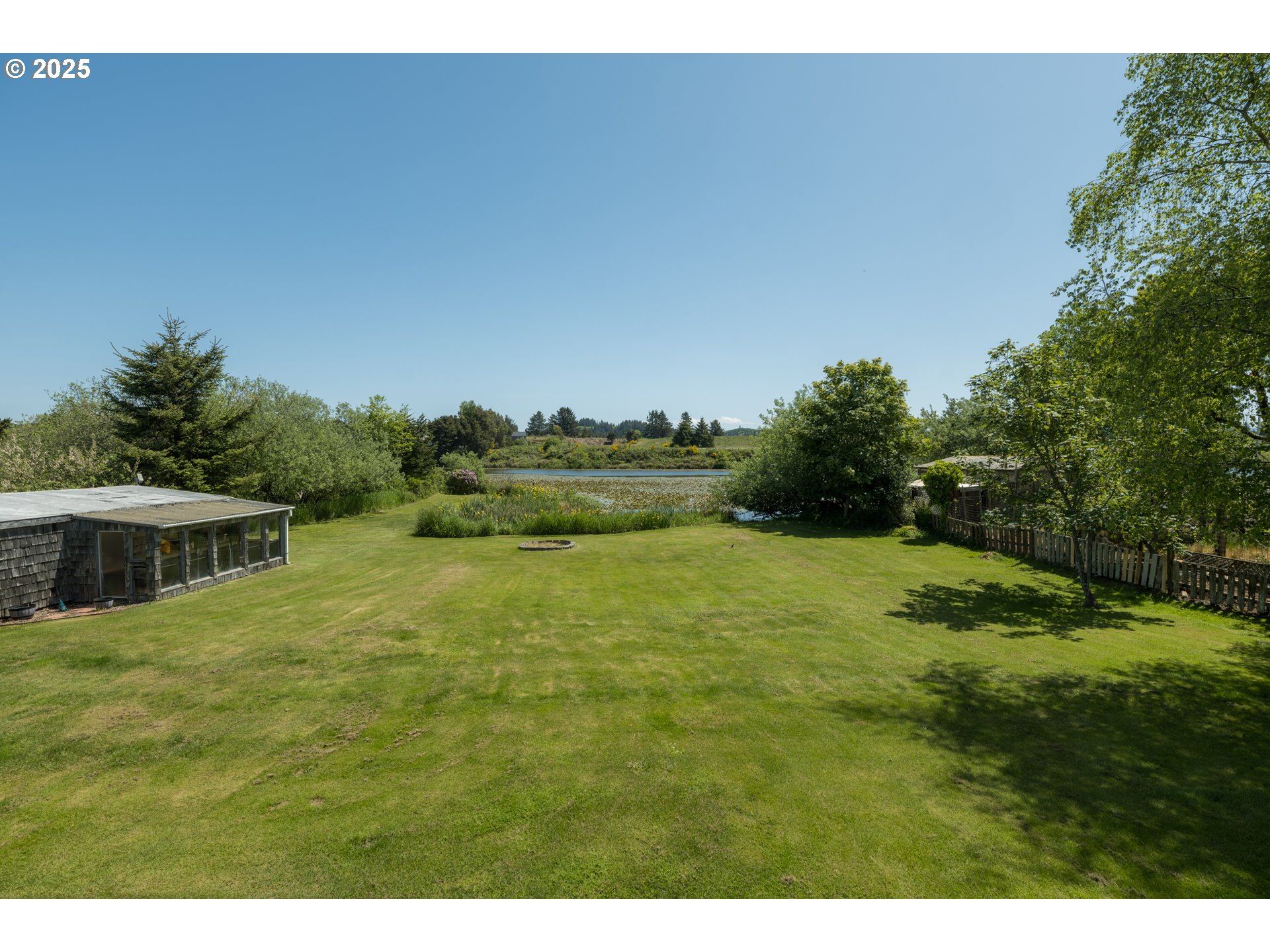 90431 Lewis Road Warrenton, OR 97146 - Photo 16 of 26 a view of an outdoor space and yard