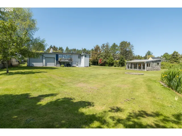 a view of a lake with a big yard